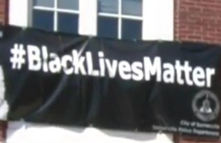 Black Lives Matter banner at Somerville City Hall via CBS Boston screengrab, 2