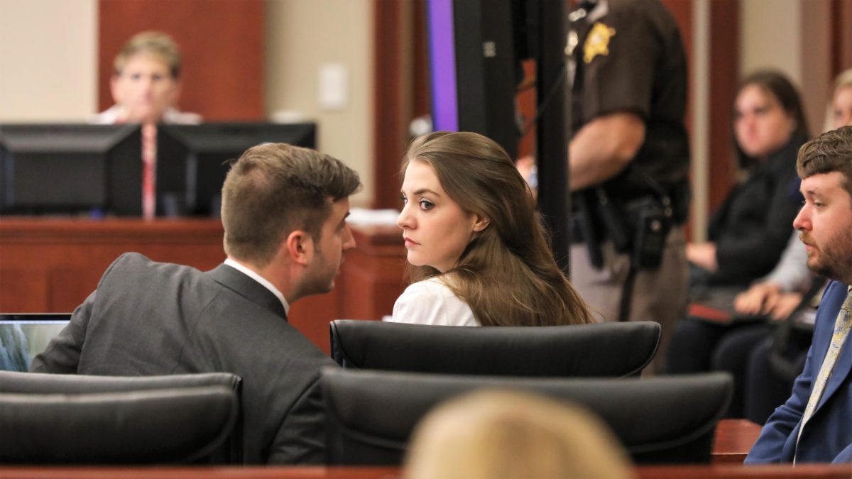 Shayna Hubers looks back as her attorneys talk opening statements during her trial at the Campbell County courthouse on Tuesday August 14, 2018.