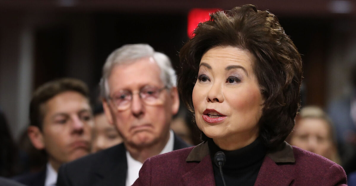 WASHINGTON, DC - JANUARY 11: Elaine Chao testifies during her confirmation hearing to be the next U.S. secretary of transportation before the Senate Commerce, Science and Transportation Committee as her husband, Senate Majority Leader Mitch McConnell (R-KY) (2nd L) looks on, in the Dirksen Senate Office Building on Capitol Hill January 11, 2017 in Washington, DC. Chao, who has previously served as secretary of the Labor Department, was nominated by President-elect Donald Trump.