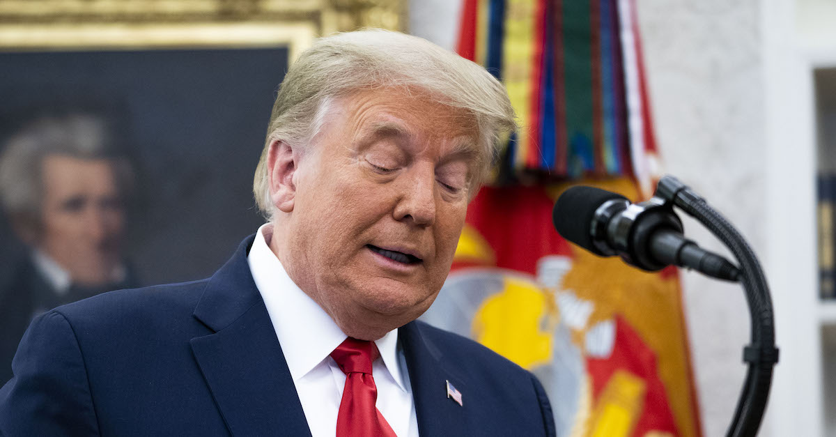 WASHINGTON, DC - DECEMBER 03: President Donald Trump speaks about the election after presenting the Medal of Freedom to former college football coach Lou Holtz in the Oval Office of the White House on December 3, 2020 in Washington, DC. Holtz is best known for his time as head coach of University of Notre Dame's football team, winning a national championship in the 1988 season.