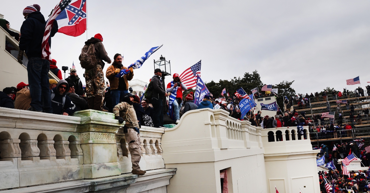Thousands of Donald Trump supporters storm the United States Capitol building following a "Stop the Steal" rally on January 06, 2021 in Washington, DC.