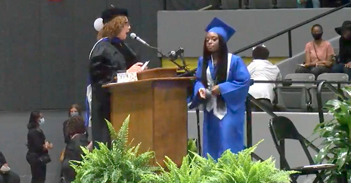 Kennedy Hobbs ascends the stage at graduation.