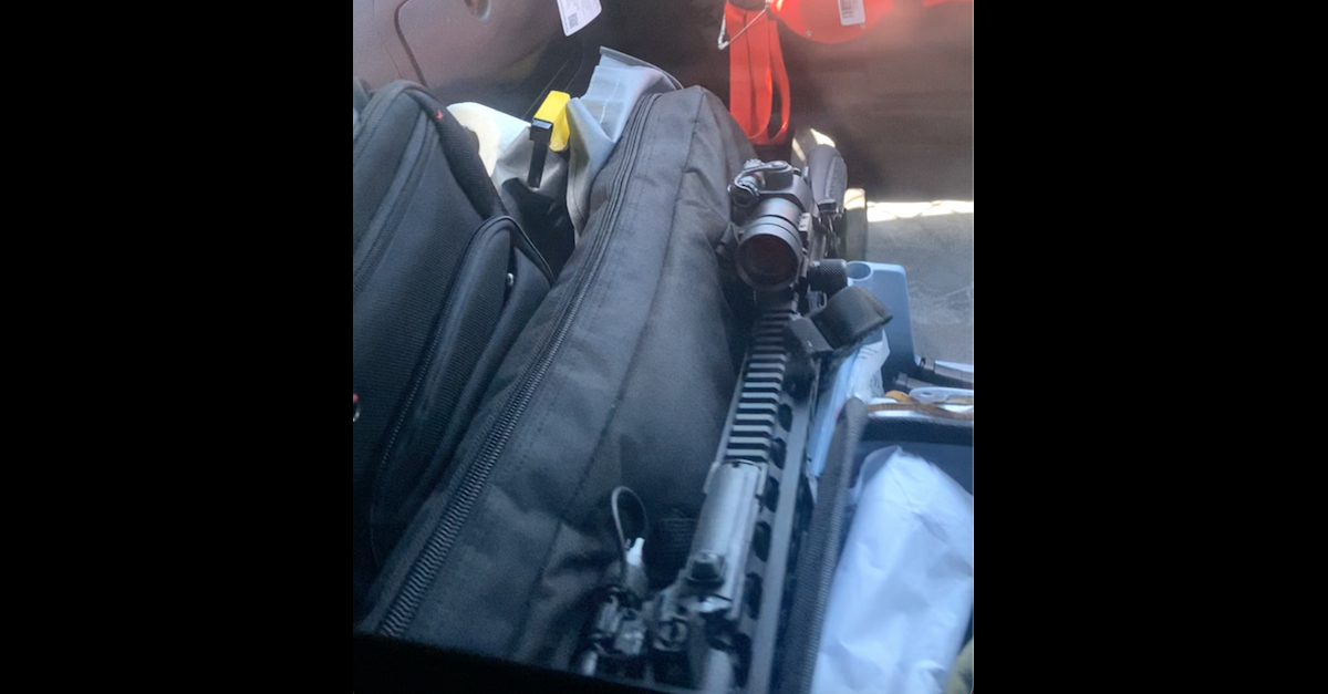 A so-called "assault rifle" appears in a selfie video which appears to have been recorded by Doffis “Tre” Absher II while he was sitting in a squad car with Aiden Fucci.