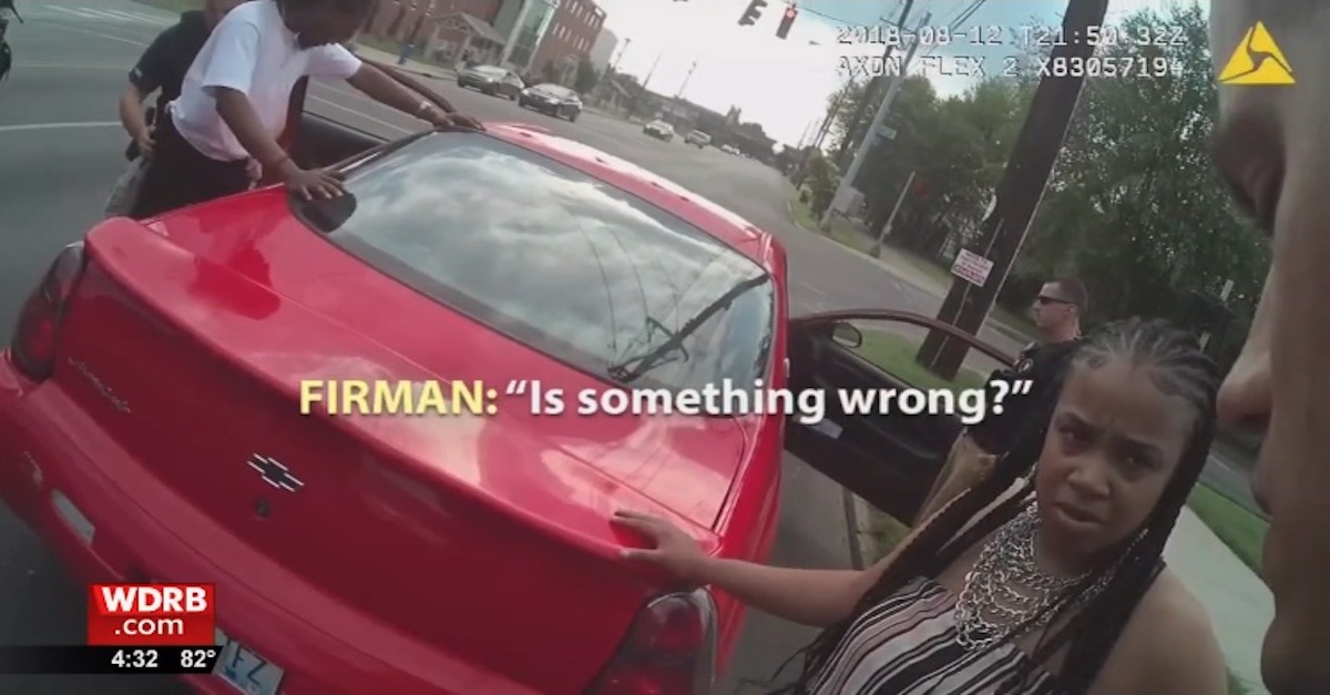 Anthony Parker and Demetria Firman are questioned by Louisville police in August 2018.