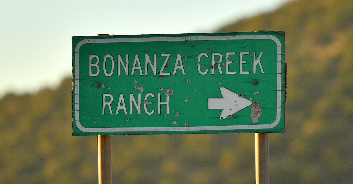 A sign points to the direction of the Bonanza Creek Ranch where a fatal shooting occurred on a movie set on October 22, 2021 in Santa Fe, New Mexico. Director of Photography Halyna Hutchins was killed and director Joel Souza was injured on set while filming the movie "Rust" with actor and producer Alec Baldwin. (Photo by Sam Wasson/Getty Images)