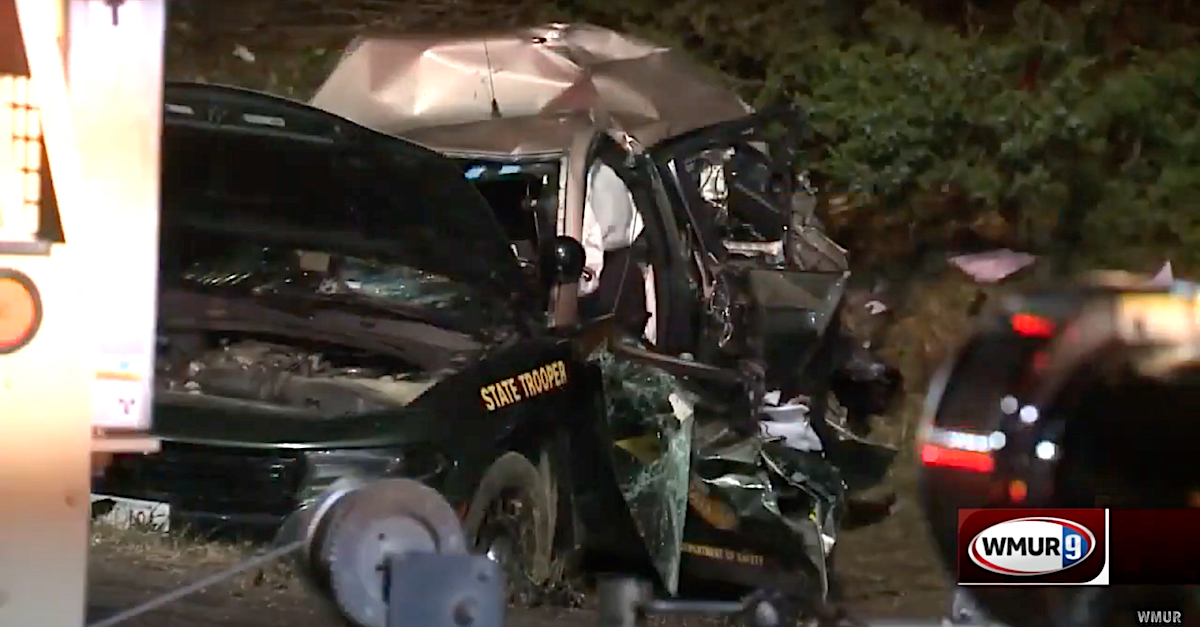 A tractor-trailer collision destroyed a vehicle driven by New Hampshire State Police Staff Sgt. Jesse Sherrill on Oct. 28, 2021. Sgt. Sherrill died as a result of the crash. (Image via screengrab from WMUR-TV.)