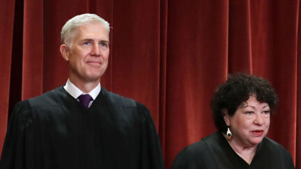 United States Supreme Court Justices Neil Gorsuch (L) and Sonia Sotomayor (R) pictured posing for an official court photo.