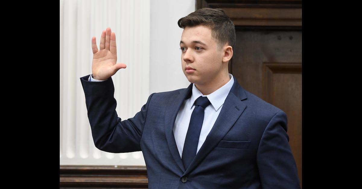 Kyle Rittenhouse takes an oath to testify in his intentional homicide trial on Nov. 10, 2021, in Kenosha, Wis. (Image © Mark Hertzberg/ZUMA Press Wire/Pool.)