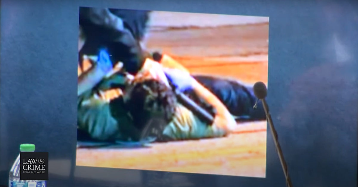 Anthony Huber and Kyle Rittenhouse appear in an Aug. 25, 2020 image showed by defense attorneys during opening statements. Rittenhouse, in green, is on the ground. (Image via the Law&Crime Network.)