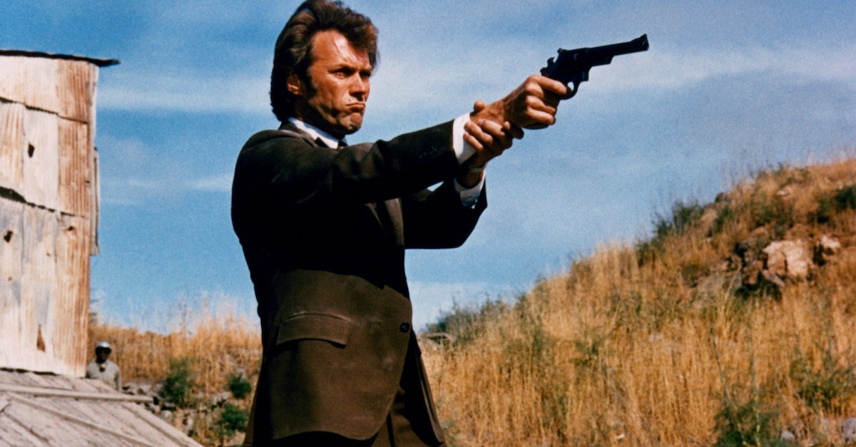 Clint Eastwood points a gun in a scene from the film ‘Dirty Harry’, 1971. (Photo by Warner Brothers/Getty Images)