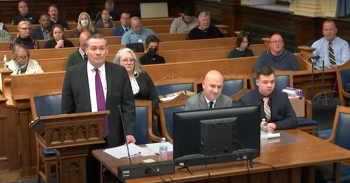 Defense attorney Corey Chirafisi began to grin when Judge Bruce Schroeder asked for a round of applause for military veterans. (Image via the Law&Crime Network.)
