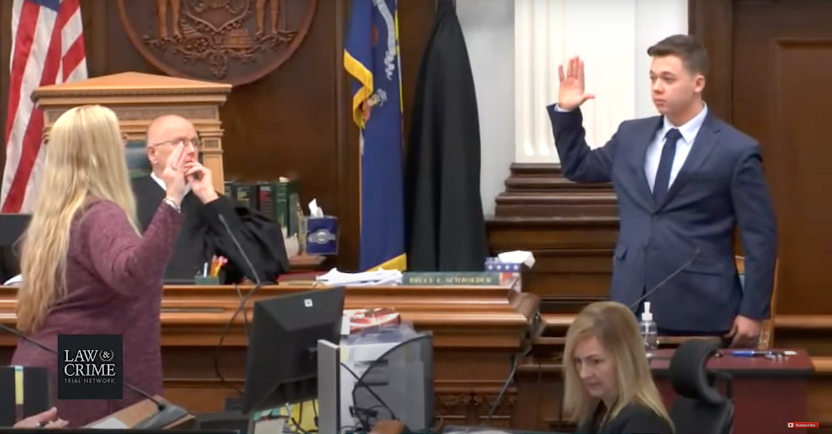Kyle Rittenhouse takes the oath to tell the truth as a witness on Nov. 10, 2021, during his first-degree intentional homicide trial. Rittenhouse said he shot three people, killing two of them, in self defense. (Image via screengrab from the Law&Crime Network.)