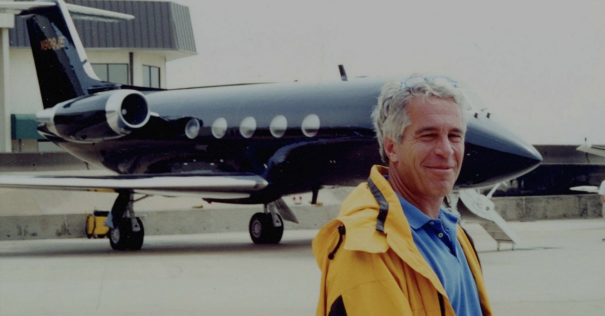 Jeffrey Epstein stands in front of his Gulfstream