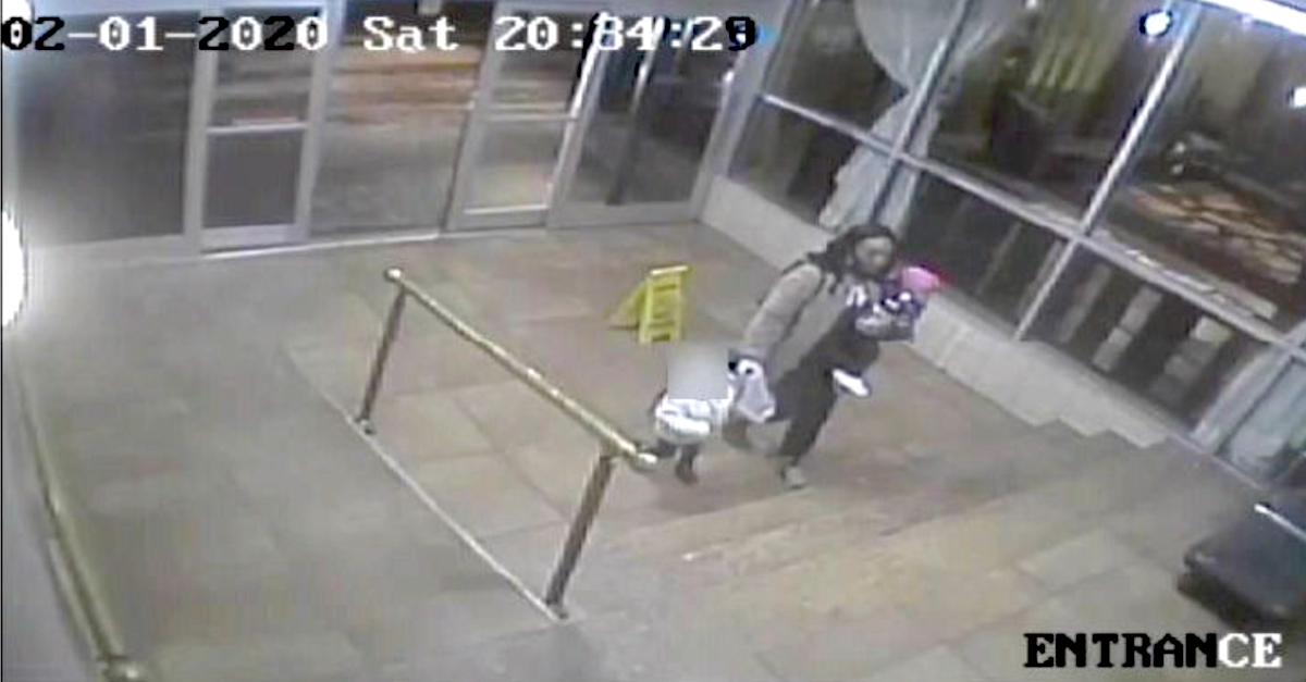 Hotel security footage shows Tyra Monae Anderson carrying the decedent in her arms while leading another of her children by the hand.