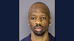 Somorie Moses appears in a mugshot.