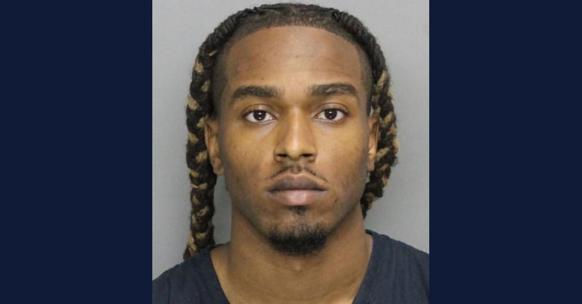 Bryan Anthony Rhoden appears in a mugshot