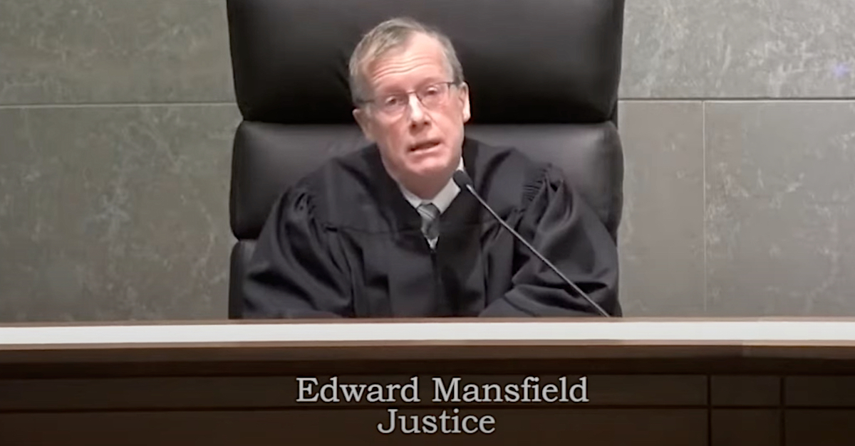 Justice Edward Mansfield asked during oral arguments about abortion whether a Covid-19 vaccine mandate would be constitutional. The issues are legally similar, as both involve whether patients have a liberty interest in making their own healthcare decisions. (Image via YouTube screengrab.)