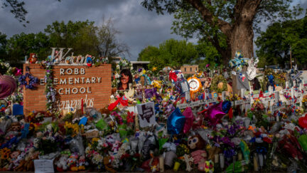 A memorial dedicated to the 19 children and two adults killed on May 24th during the mass shooting at Robb Elementary School is seen on June 1, 2022 in Uvalde, Texas. (Photo by Brandon Bell/Getty Images.)