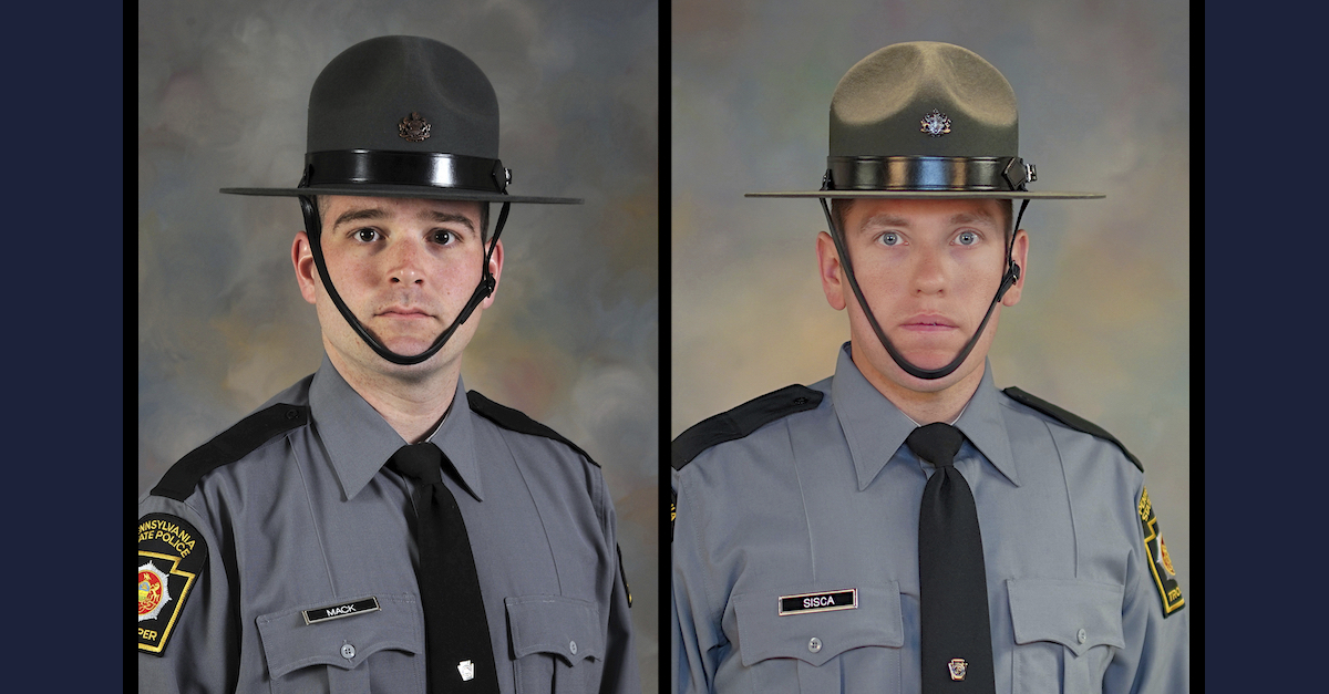 Fallen Troopers Pennsylvania State Police Troopers Martin Mack III and Branden Sisca appear in official portraits.