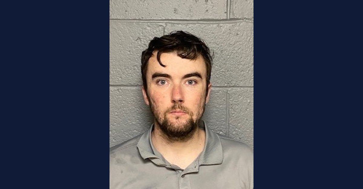 Ryan Corcoran appears in a mugshot