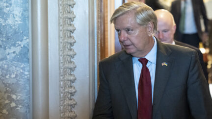 Lindsey Graham is seen leaving the Senate Chamber on Aug. 7, 2022, after Senate passed the Inflation Reduction Act.
