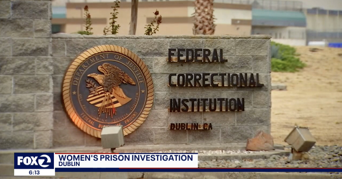 An image shows the sign on a prison.