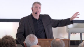 A video screengrab shows Mark Houck giving a speech.