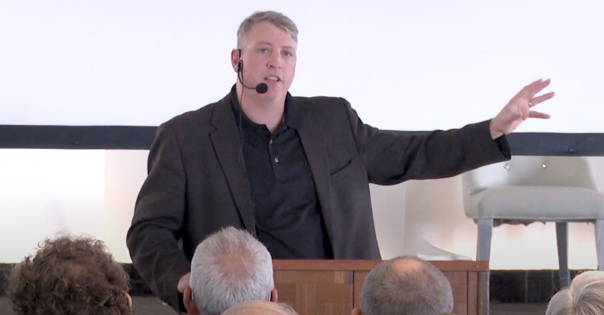 A video screengrab shows Mark Houck giving a speech.