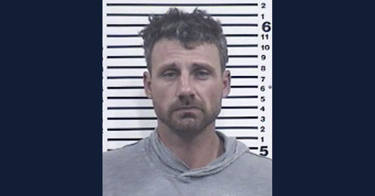 Derek Gandall appears in a mugshot