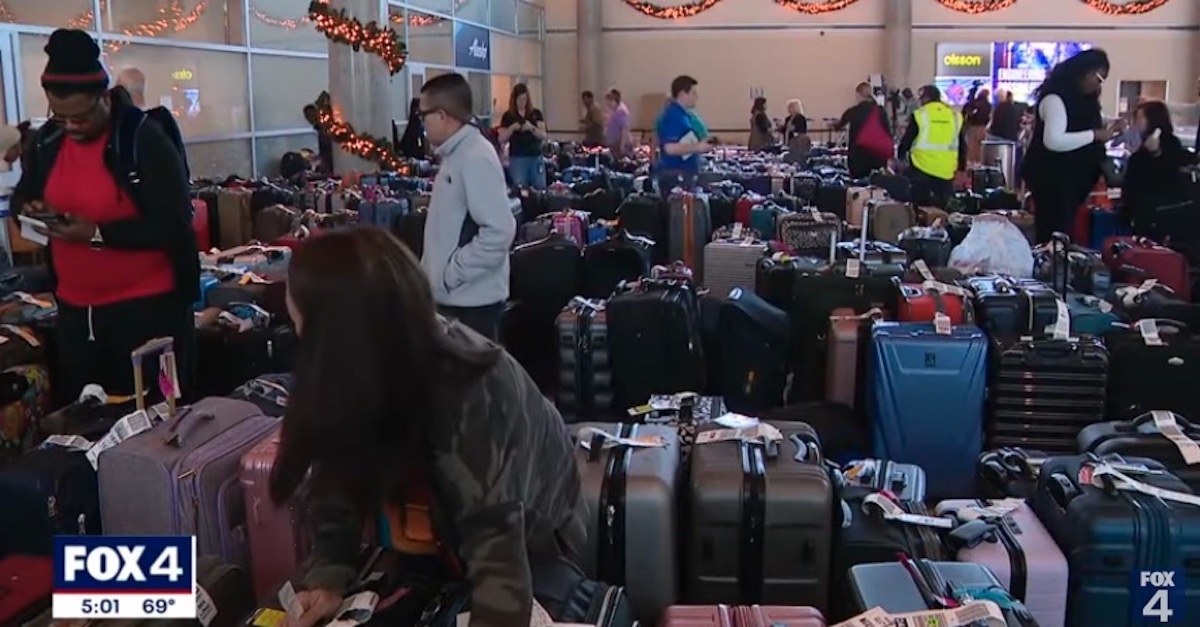Hundreds of suitcases are lined up at Dallas Love Field Airport 