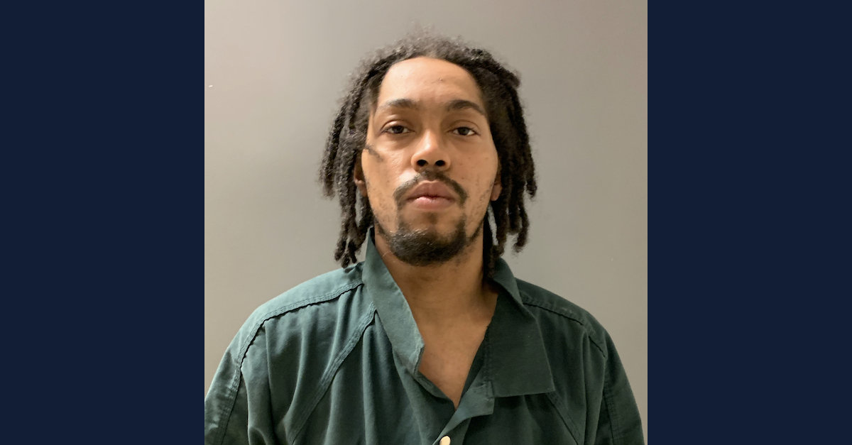 Torrey Moore appears in a mugshot