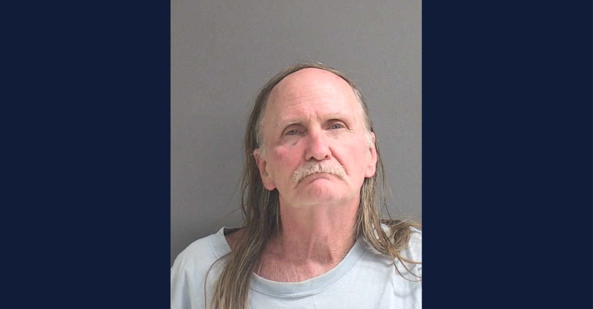 Lawrence Edward Cohen (pictured here) allegedly trapped three tenants inside their garage apartment. The garage door was broken, deputies said. The victims could not leave because Cohen blocked the way with a chair and threatened to kill them, documents said. 