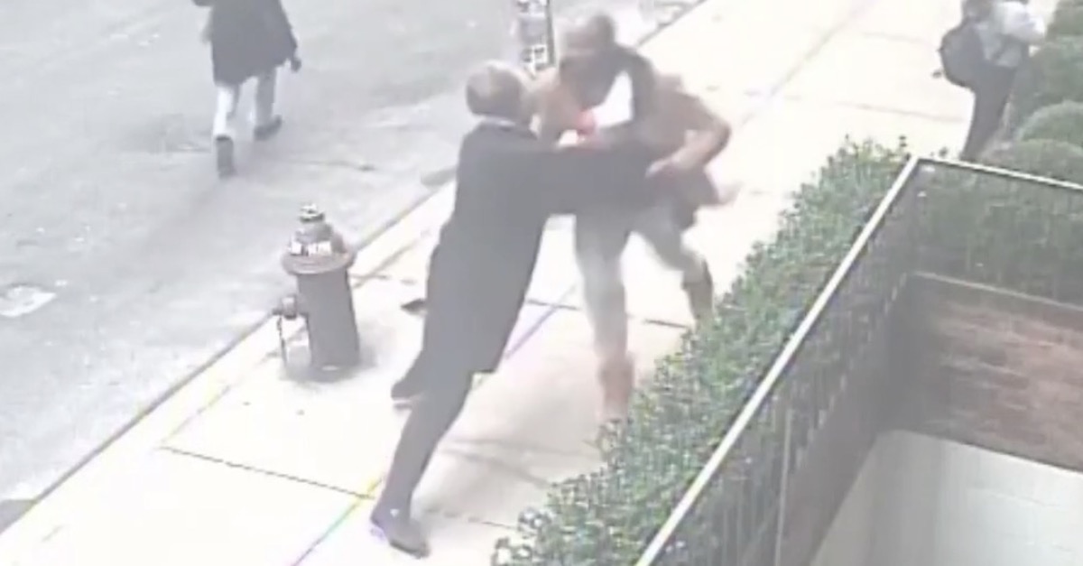 Jason Fleming being stopped by a good Samaritan in NYC (U.S. Attorney's Office Screenshot)
