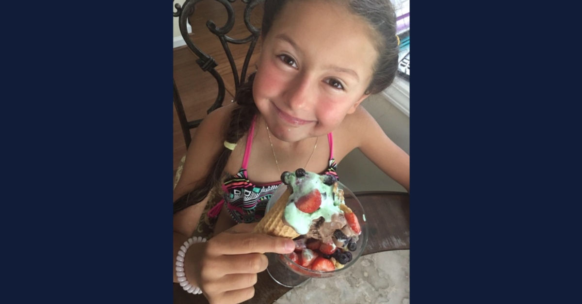 Madalina Cojocari was last seen in late November 2022, but police claim her mother only reported her missing the following month. "The 6th grade middle school student loves horses & you can see how happy she is to have a big bowl of ice cream," the FBI wrote. (Image: FBI)