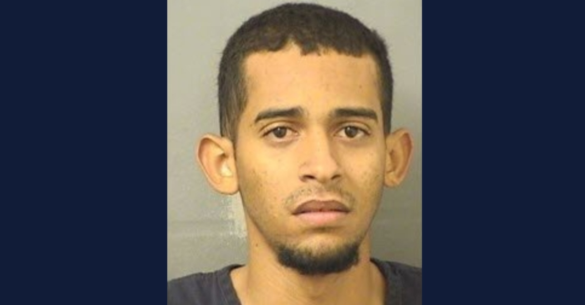 Jorge Dupre Lachazo, 24, beat and burned Evelyn Smith Udell, 75, police said. (Mugshot: Boca Raton Police Department)