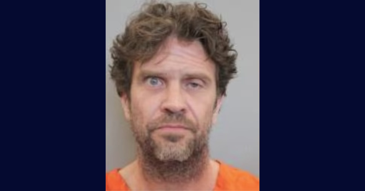 Justin Reilly Belton, 44, figured four puppies, either removing legs or in one instance, a paw, authorities said. (Mugshot: Houston Police Department)