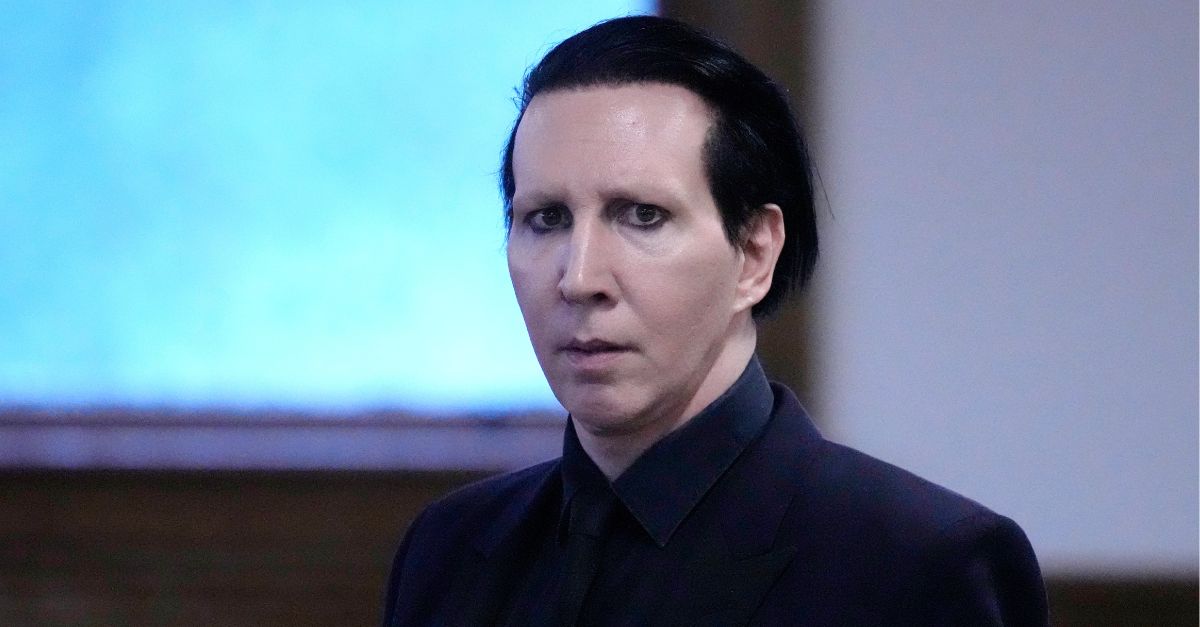 Musical artist Marilyn Manson, whose legal name is Brian Hugh Warner, arrives for an appearance in Belknap Superior Court, Monday, Sept. 18, 2023, in Laconia, N.H. (AP Photo/Charles Krupa)