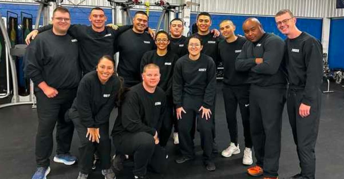 Taylor Hagan appears in a photo with her police academy class, center with glasses