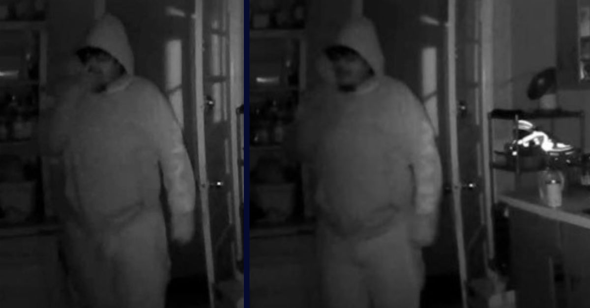 A man appears in two images breaking into a house in Coatesville