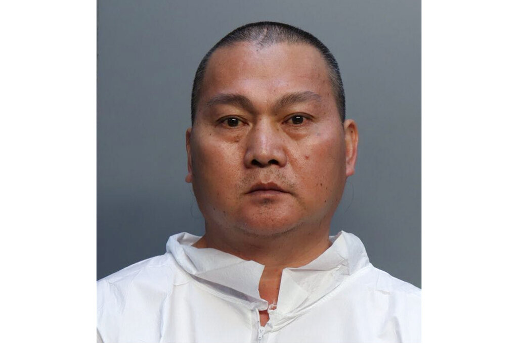 This photo provided by the Miami-Dade Corrections & Rehabilitation Department shows Chen Wu. Oklahoma prosecutors say the man accused of killing four people at a marijuana farm had demanded his $300,000 investment in the operation be returned shortly before he started shooting. Prosecutors charged 45-year-old Chen Wu on Friday with four counts of first-degree murder and one count of assault and battery with a deadly weapon. Wu is also identified in jail records as Wu Chen. Jail and court records don