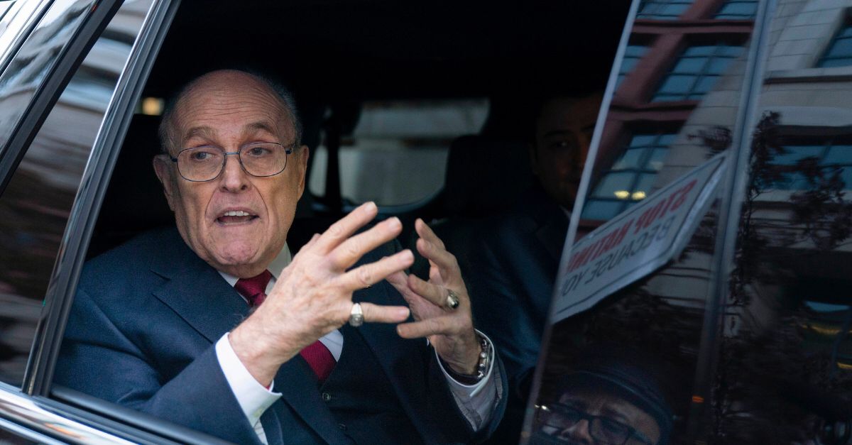Former Mayor of New York Rudy Giuliani talks to reporters as he leaves after his defamation trial in Washington, Friday, Dec. 15, 2023. A jury awarded $148 million in damages on Friday to two former Georgia election workers who sued Giuliani for defamation over lies he spread about them in 2020 that upended their lives with racist threats and harassment. (AP Photo/Jose Luis Magana, File)