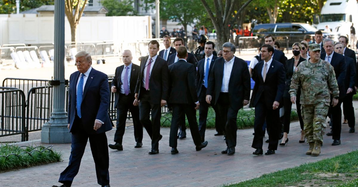 In this June 1, 2020 file photo, President Donald Trump walks in Lafayette Park to visit outside St. John's Church across from the White House in Washington, D.C. (AP Photo/Patrick Semansky)