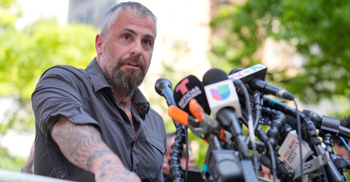Former Washington, D.C. police officer Michael Fanone speaks to reporters in support of President Joe Biden across the street from former President Donald Trump's criminal trial in New York, Tuesday, May 28, 2024. (AP Photo/Seth Wenig)