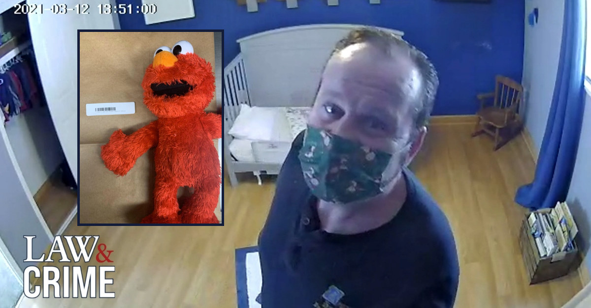 Elmo doll and Kevin Wayne VanLuven (Oakland County Sheriff