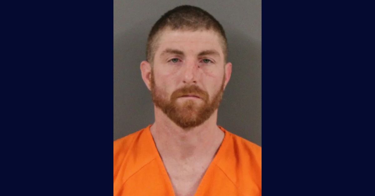 Kyle Cooper appears in a booking photo.