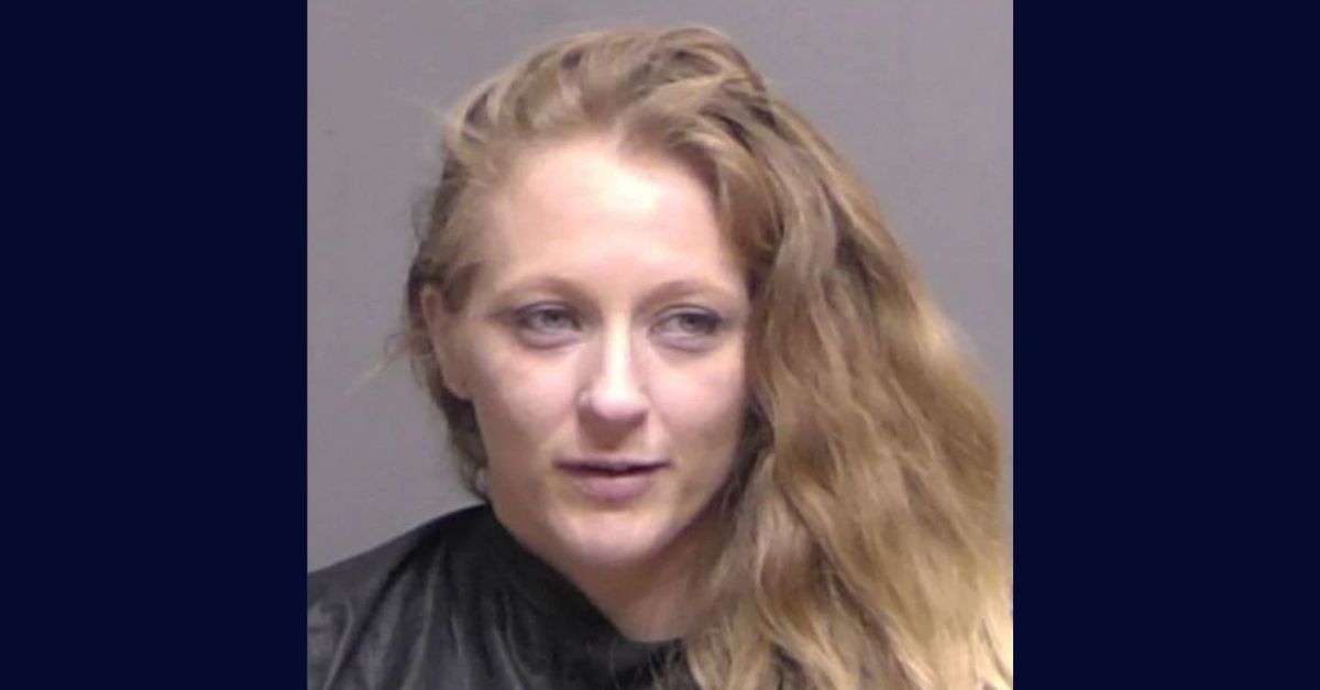 Jessica Reno appears in a booking photo.