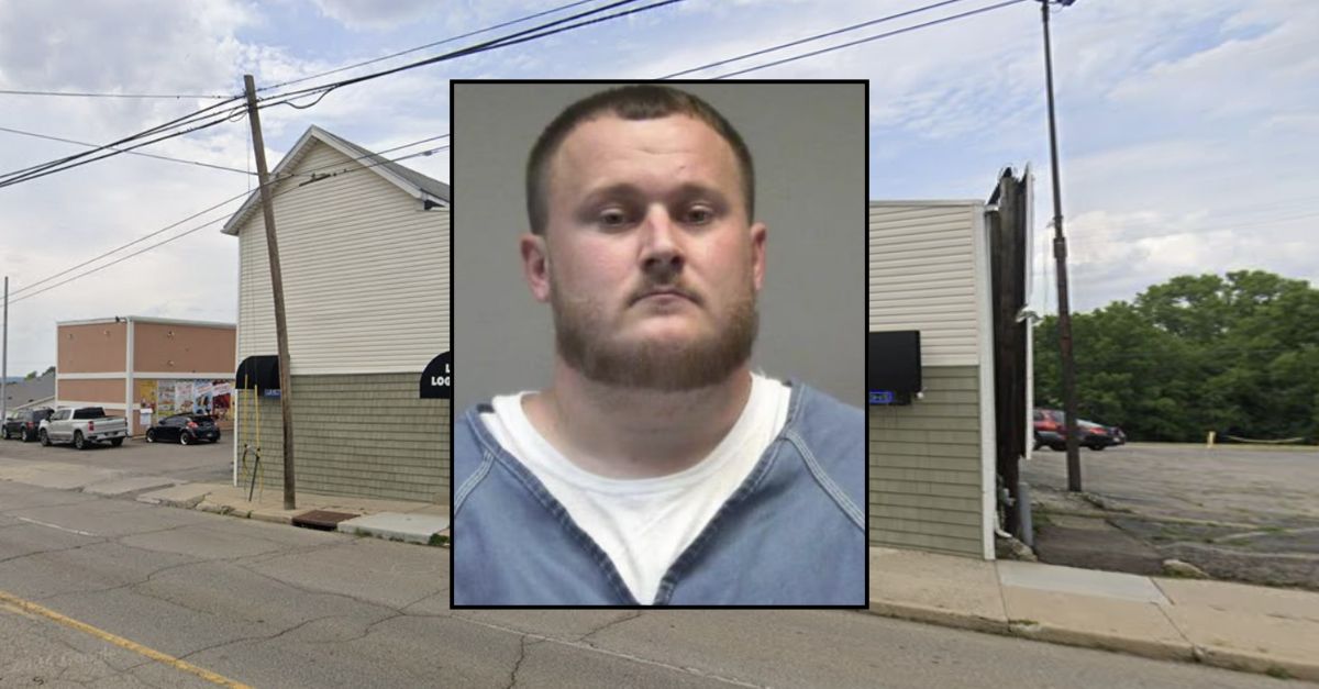 Man arrested after allegedly shooting romantic rival at bar