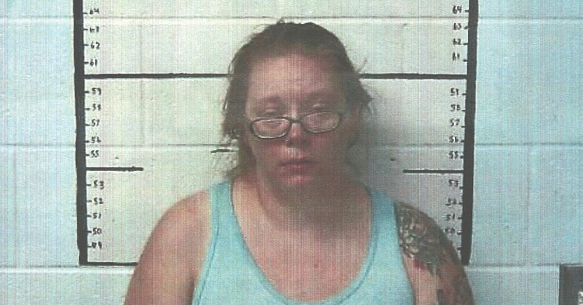 Mindy Mooney appears in a booking photo.