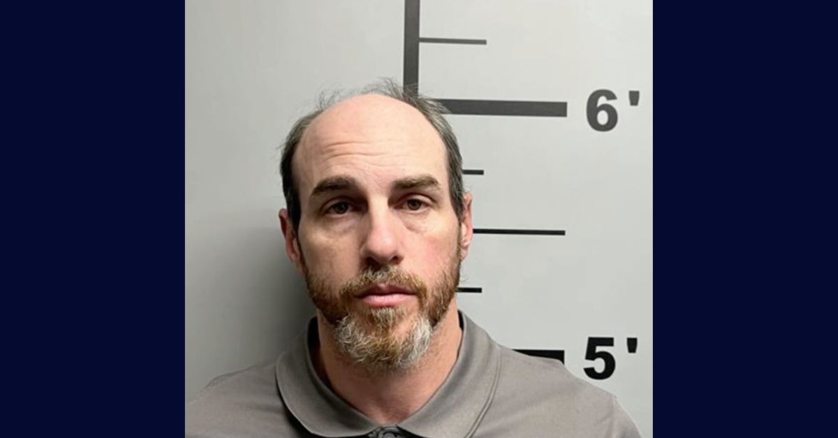 Wade Green appears in a booking photo.