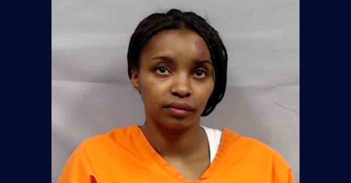 Shaniqua Gibson appears in a booking photo.